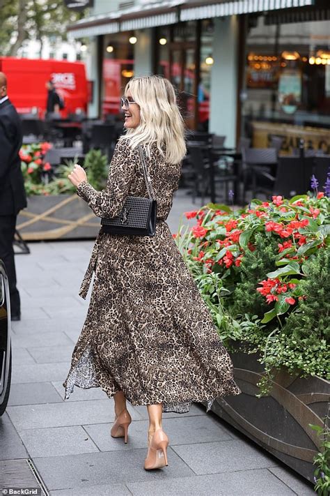 ashley roberts is the epitome of chic in a leopard print maxi dress as