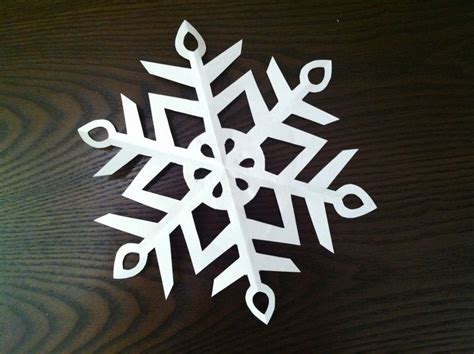How To Make A Paper Snowflake Paper Snowflakes Paper Snowflake