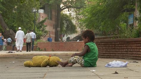 delhi india sept 29 2016 poverty in india a little homeless girl