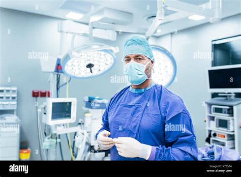 Portrait Of Male Surgeon In Operation Theater Looking At Camera Doctor