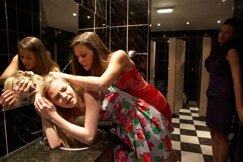 two women having a fight in bathroom stock image image of envious screaming 19682479