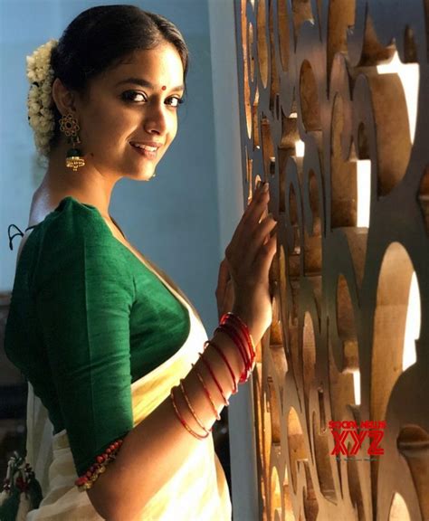 actress keerthy suresh traditional saree stills for onam