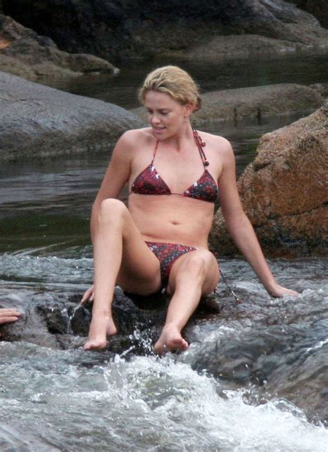 Charlize Theron Showing Her Sexy Underwear While She Getting Out Of The