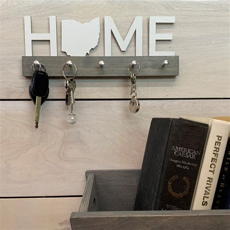home state key holder pinecone home