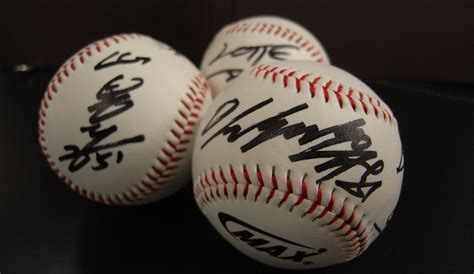 A Look At A Babe Ruth Signed Baseball And A Baseball Cards
