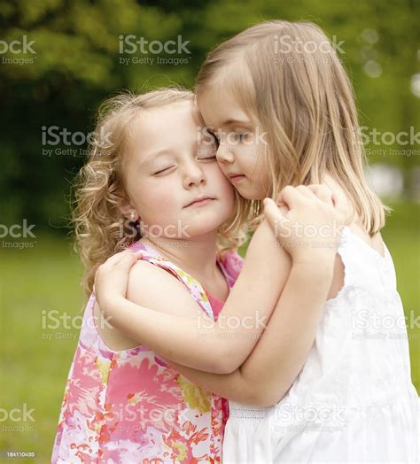 Friends Forever Two Girls Hugging Each Other With Eyes Closed Stock