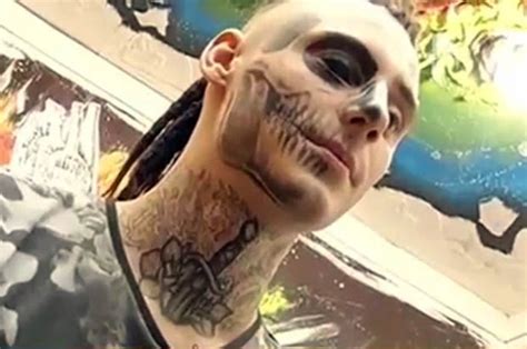 teen nikita lesnoy gets skull tat on half his face