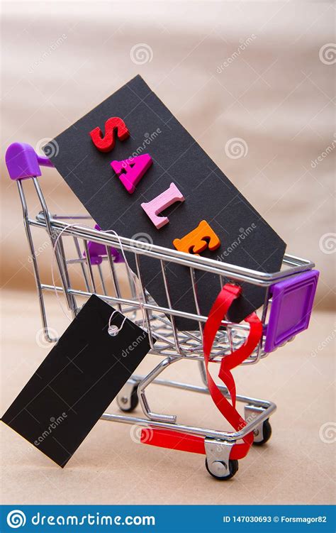 black tag   words sale  caddy  shopping cardboard label   inscription sale