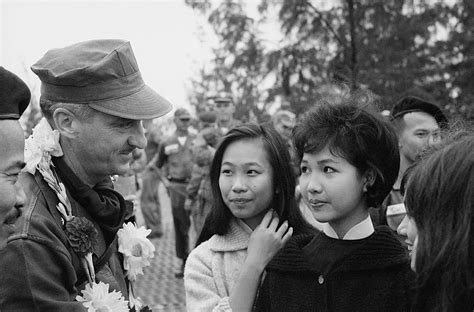 Vietnam War 1965 General Greeted By Vietnamese Women At