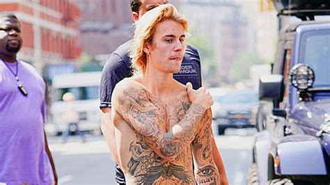 justin bieber shirtless shows off tattoos in nyc