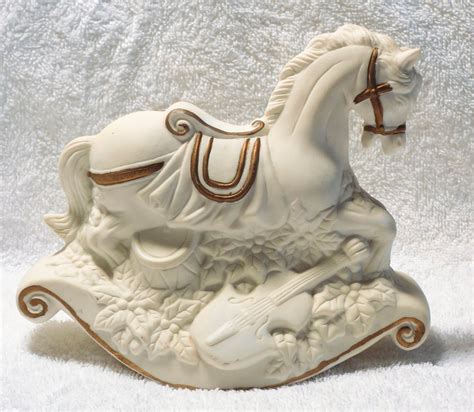 vintage porcelain rocking horse  box  gold trim plays white christmas  images