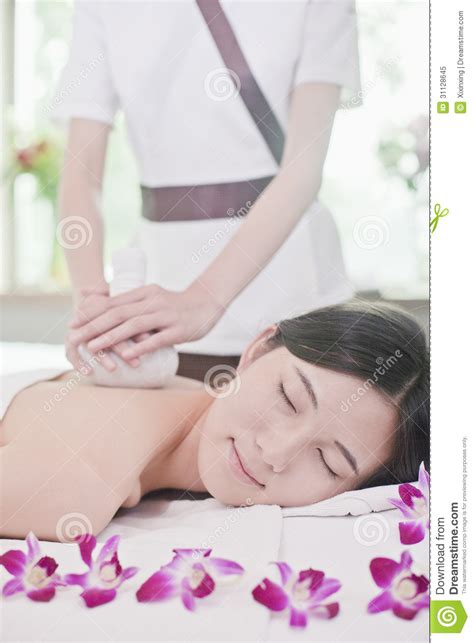 Relaxed Women Receiving Herbal Massage Flowers Stock Image Image Of