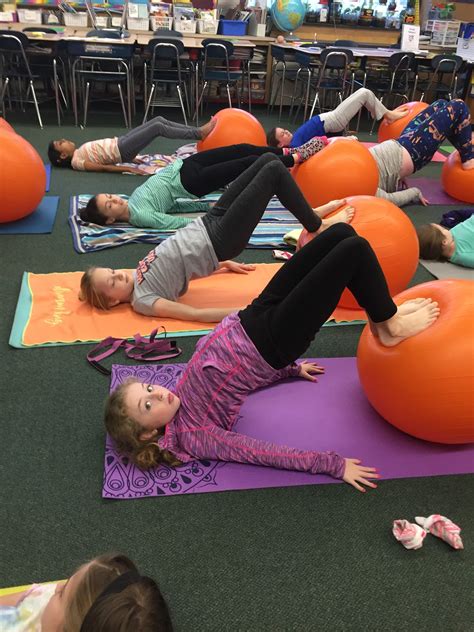 kids keeping  rise  shine yoga  yoga balls