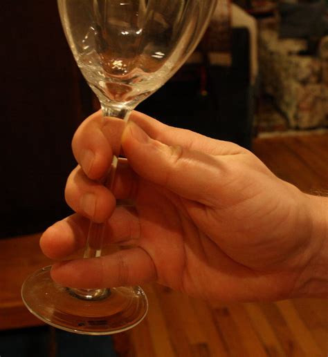 speaking  local vinacular   hold  wine glass properly
