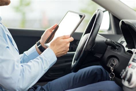 close   young man  tablet pc driving car stock image image