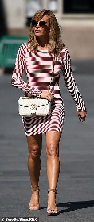 Amanda Holden Flaunts Her Tanned Legs In A Tight Red And White Stripe
