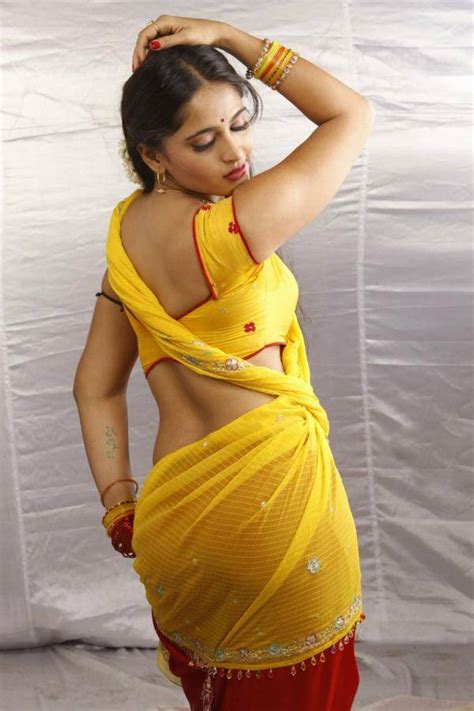 anushka shetty sexy avatar in yellow saree in movie vedam 2010