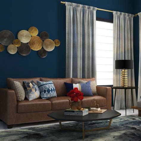navy blue wall matched   classic brown sofa