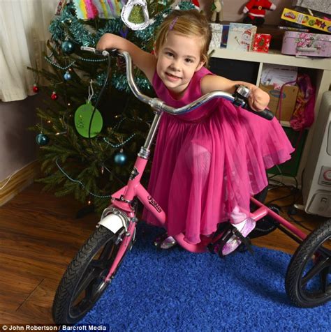 five year old meningitis survivor charlotte nott enjoys tricycle she