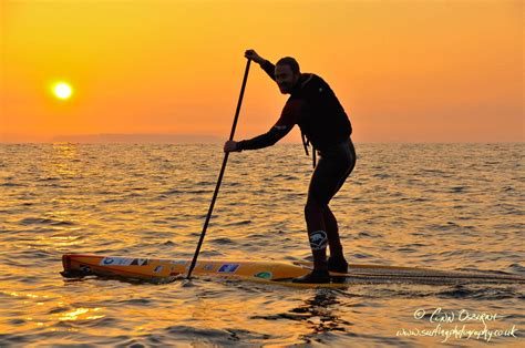 al mennie   sun rises   giant charity paddle giants causeway