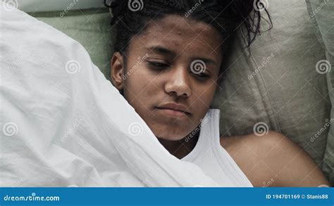 Young African Woman Waking Up In Bed At Home Bedroom Attractive Woman