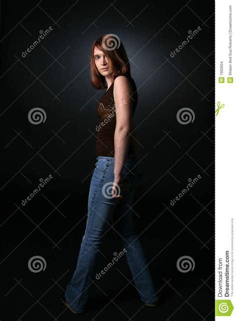 Pretty Teen Standing And Slightly Turning Stock Images