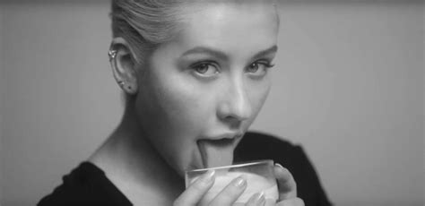 christina aguilera drips seduction in sultry photos from