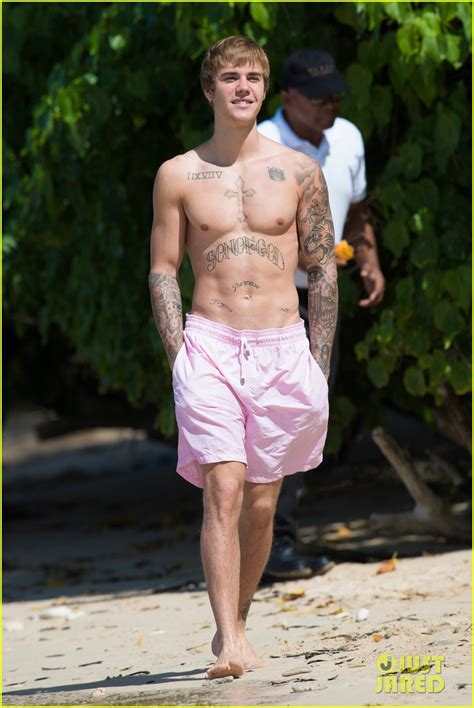 justin bieber s body is ripped in new shirtless beach