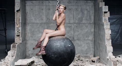 miley cyrus cries swings around naked in wrecking ball video ny daily news