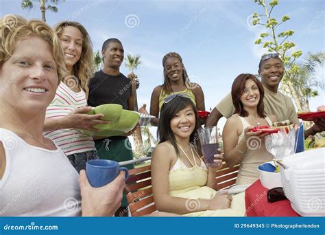 young friends eating  stock image image  picnic outdoors