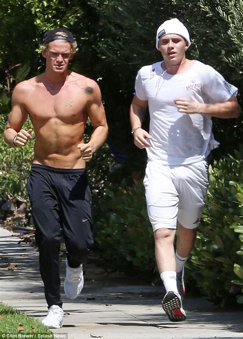 cody simpson goes for a jog with brooklyn beckham daily mail online