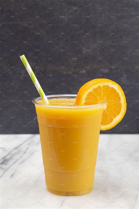 freshly squeezed orange juice stock photo  orange  juice