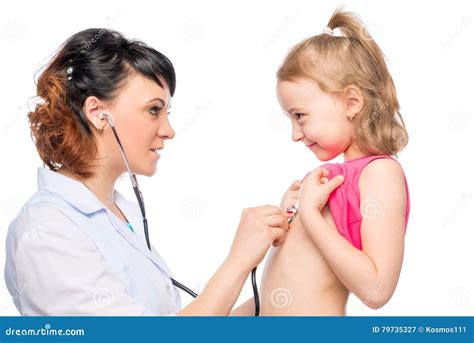 Young Pediatrician Doctor Examining Man With Stethoscope Royalty Free