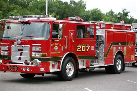 fire department dedicates  engine  heavy rescue  ceremonial