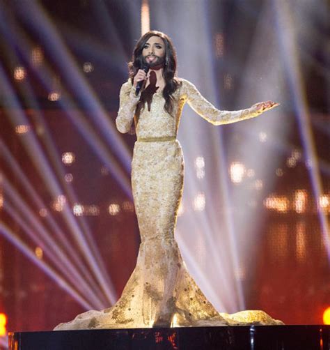 Bearded Winner Of Eurovision Inspires Russell Brand To Wear A Dress