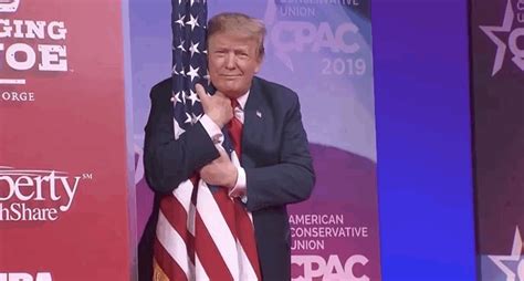 trump hugging flag gif  saturday night  find share  giphy