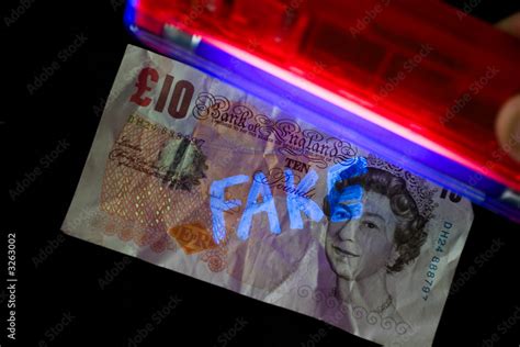 ten pound note  uv light stock photo adobe stock