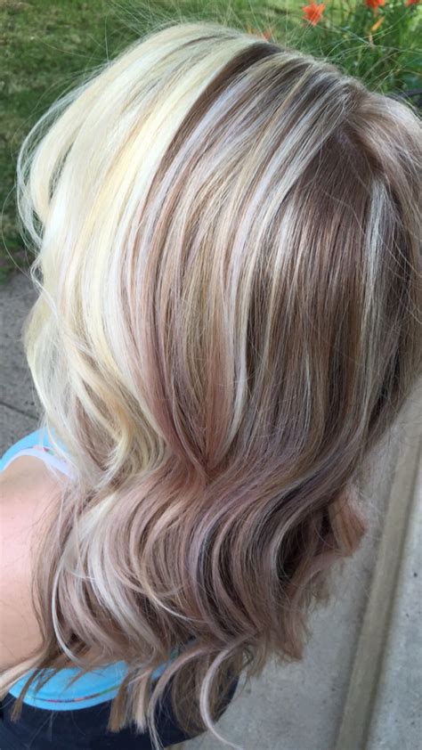 platinum face framing highlights with blonde rose gold hues and summer beach waves platinum