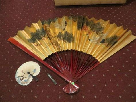 large oriental decorative fan  lambrecht auction