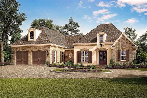 exclusive acadian french country house plan  vaulted