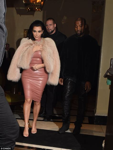 Kanye West Cant Resist Giving Wife Kim Kardashian A Cheeky Feel Of Her