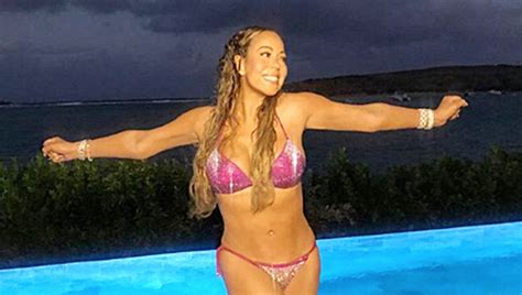 Mariah Carey Flaunts Rock Hard Abs And Cleavage In Sparkly Pink Bikini
