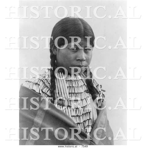 historical photo of cheyenne native woman wearing braids