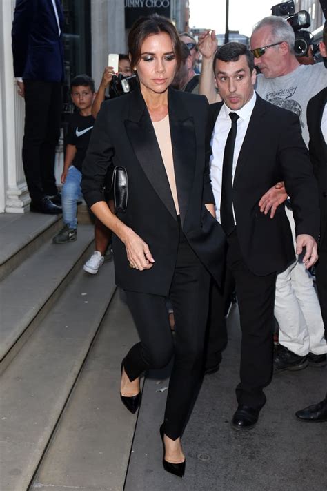 victoria beckham matching with her mom in black pantsuit popsugar