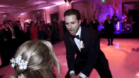 watch these groomsmen surprise a new bride with an epic dance routine at her wedding