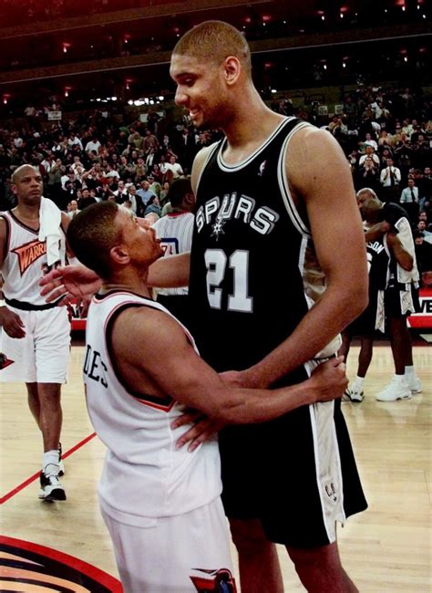 18 photos of nba players making people look tiny for the win