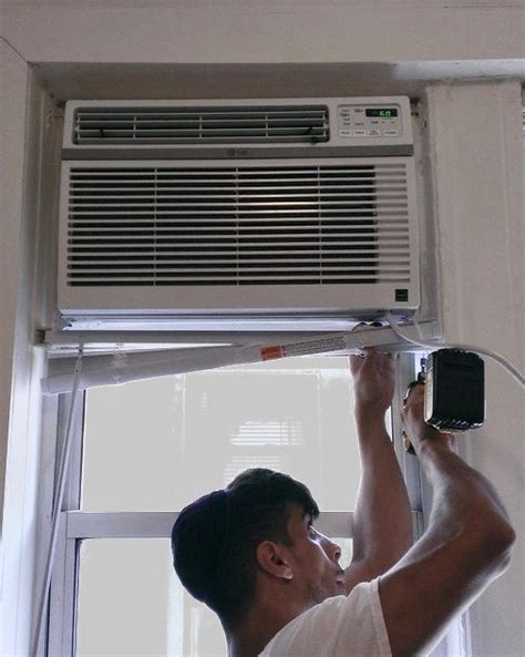install window air conditioner  storm window installing  window air conditioner