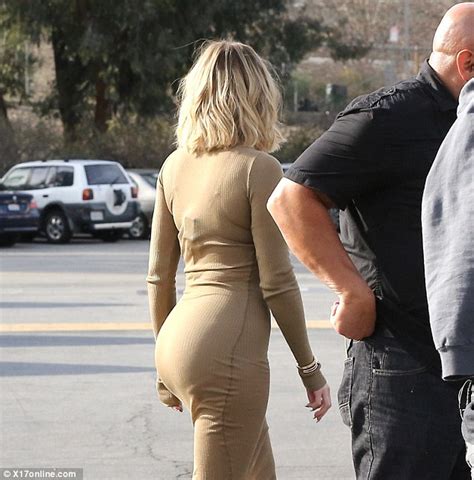 khloe kardashian wears an ultra tight dress with kylie jenner and