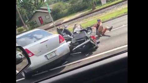 video catches man running over motorcycle in road rage incident