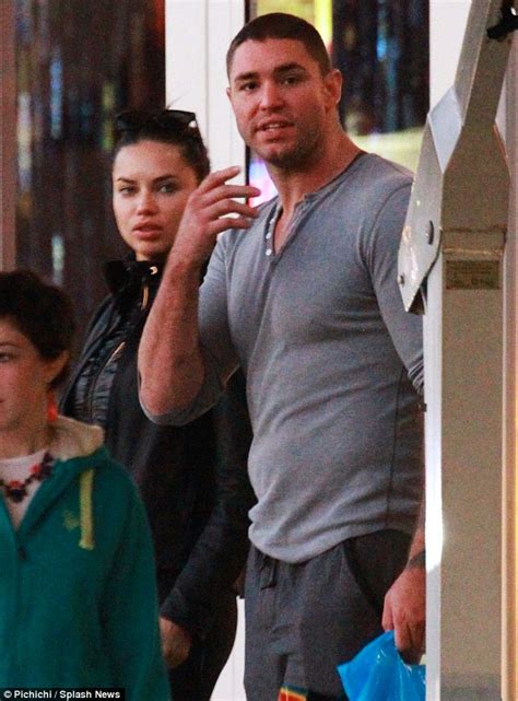 Separated Adriana Lima Holds Hands With Hunky Mystery Man As She Shops